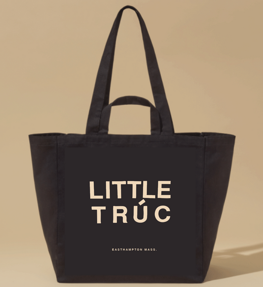 black tote bag with little truc, easthampton mass. written on it in cream lettering